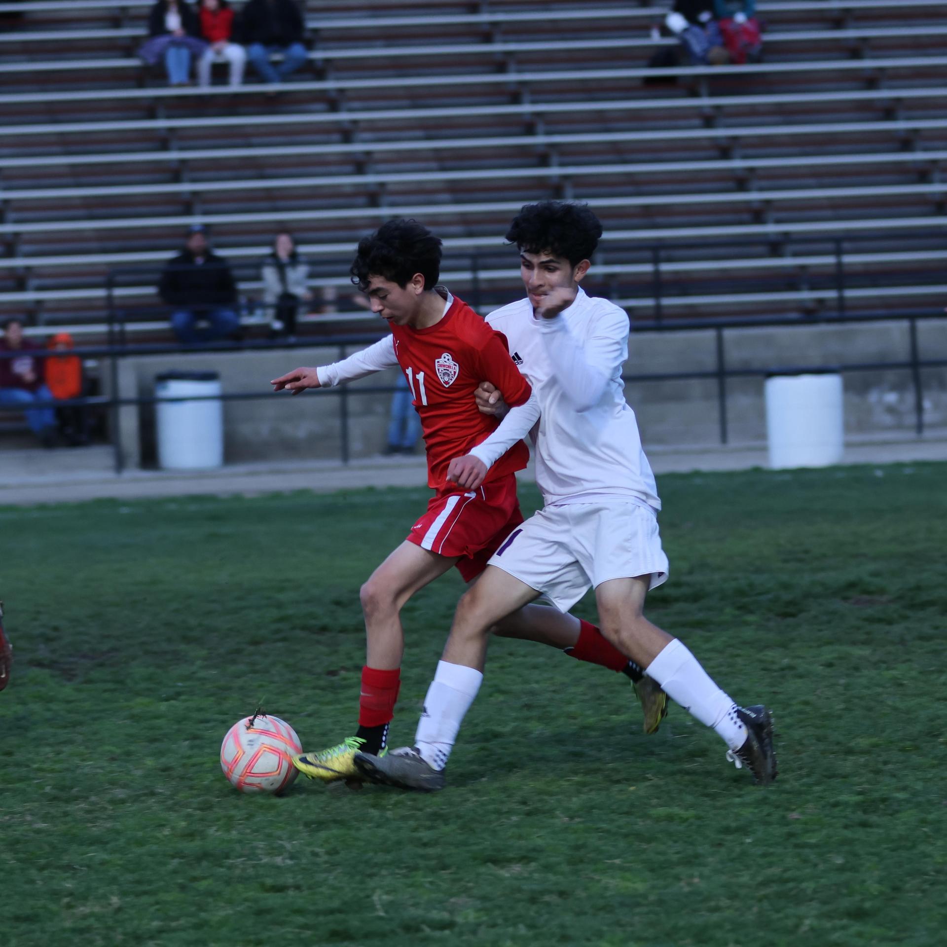 junior varsity boys playing soccer against washington union