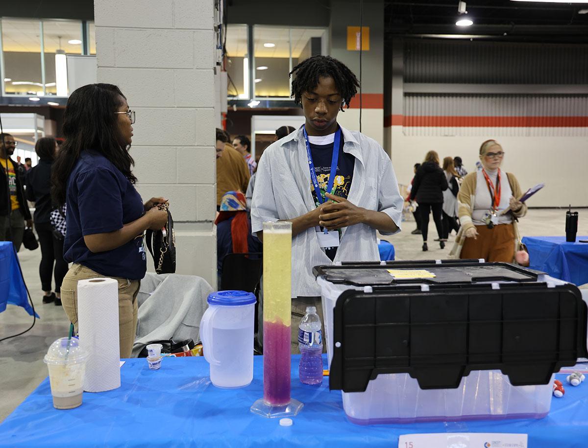 Students working on a science project outside