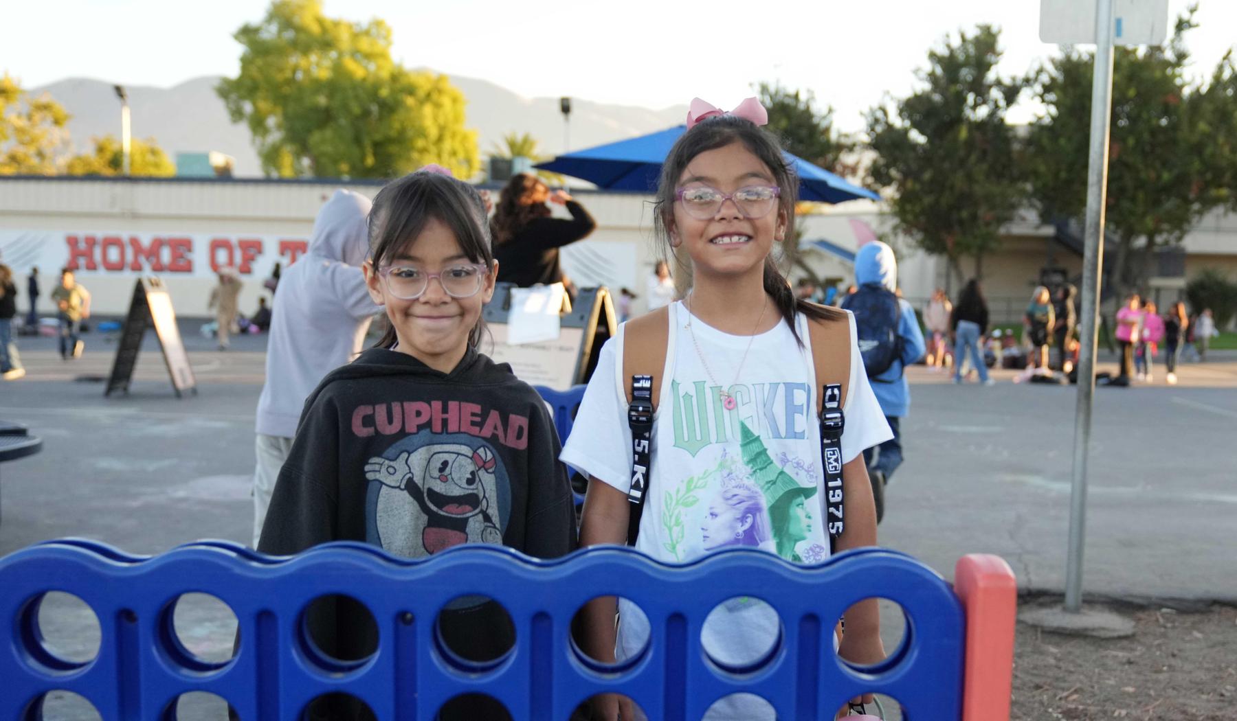 Two smiling elementary school girls