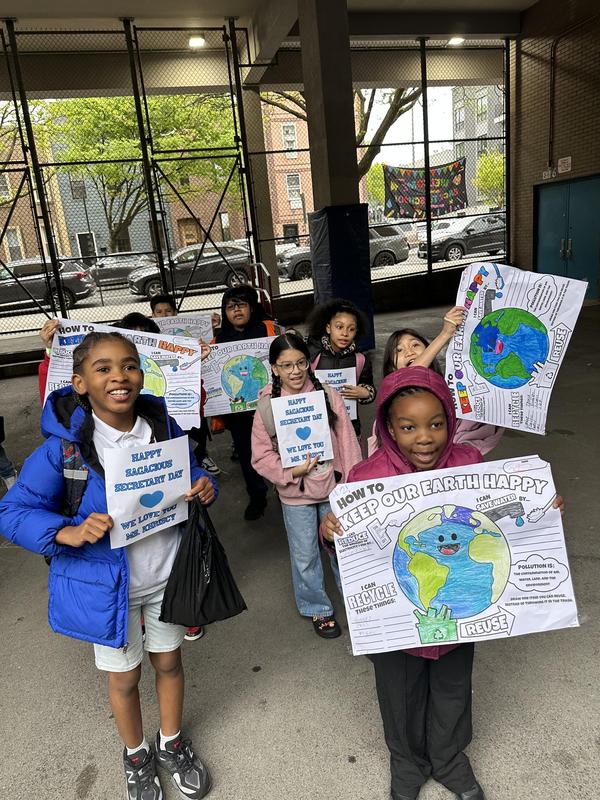 Pep rally with the students and their posters