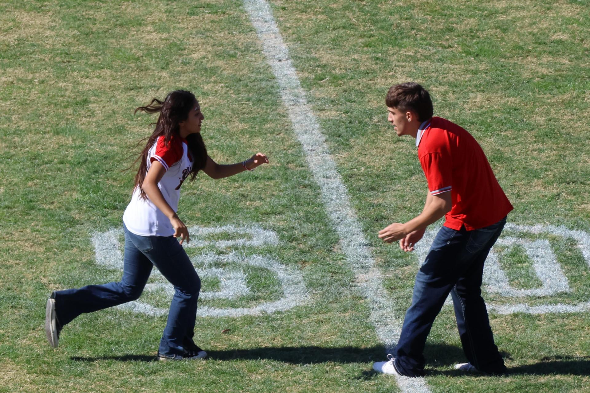 students and staff at the homecoming rally