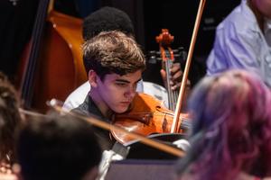 Students perform in the Woodland Hills orchestra