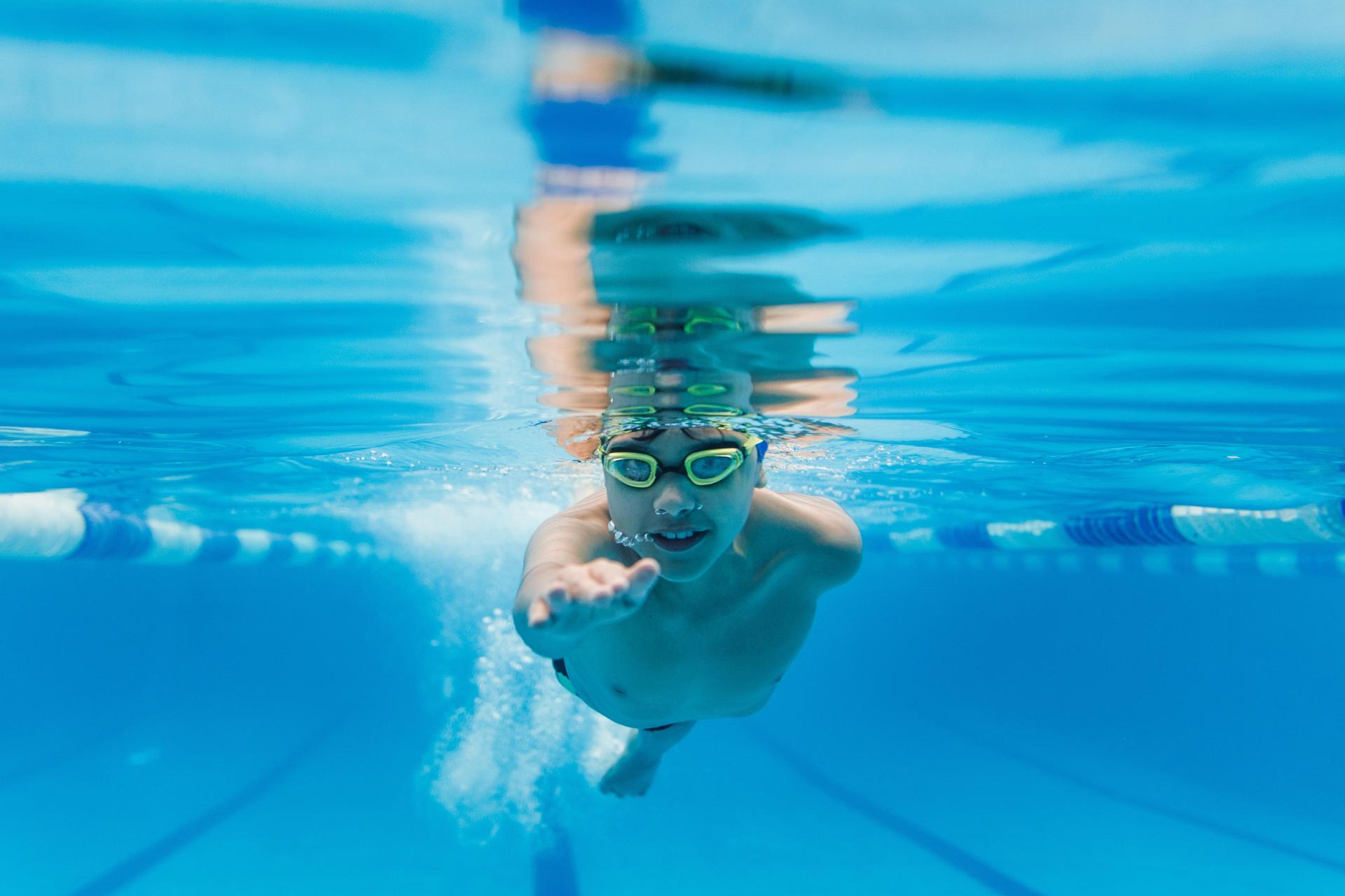student swimming