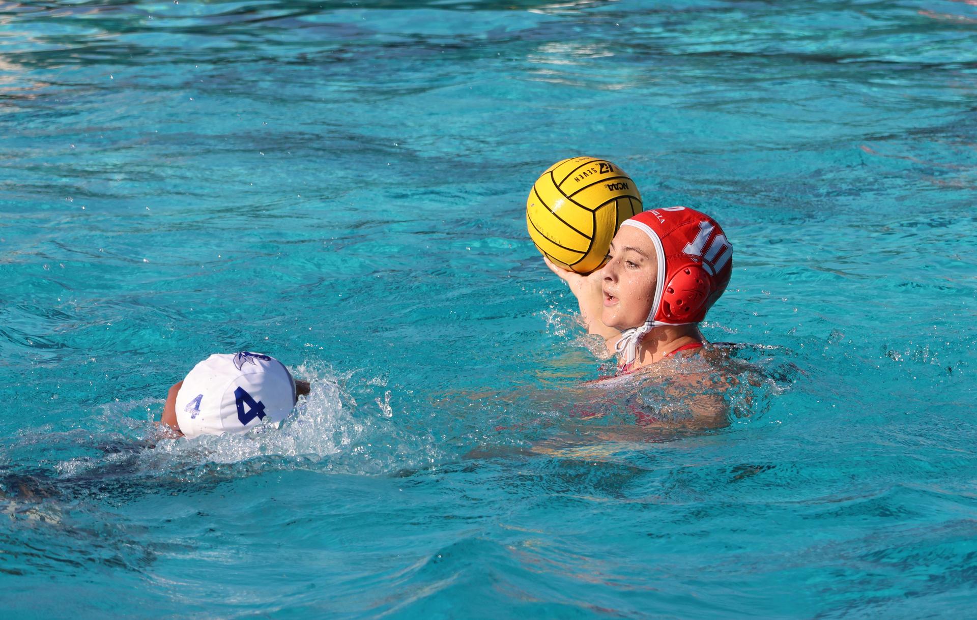 girls playing water polo against Sanger West