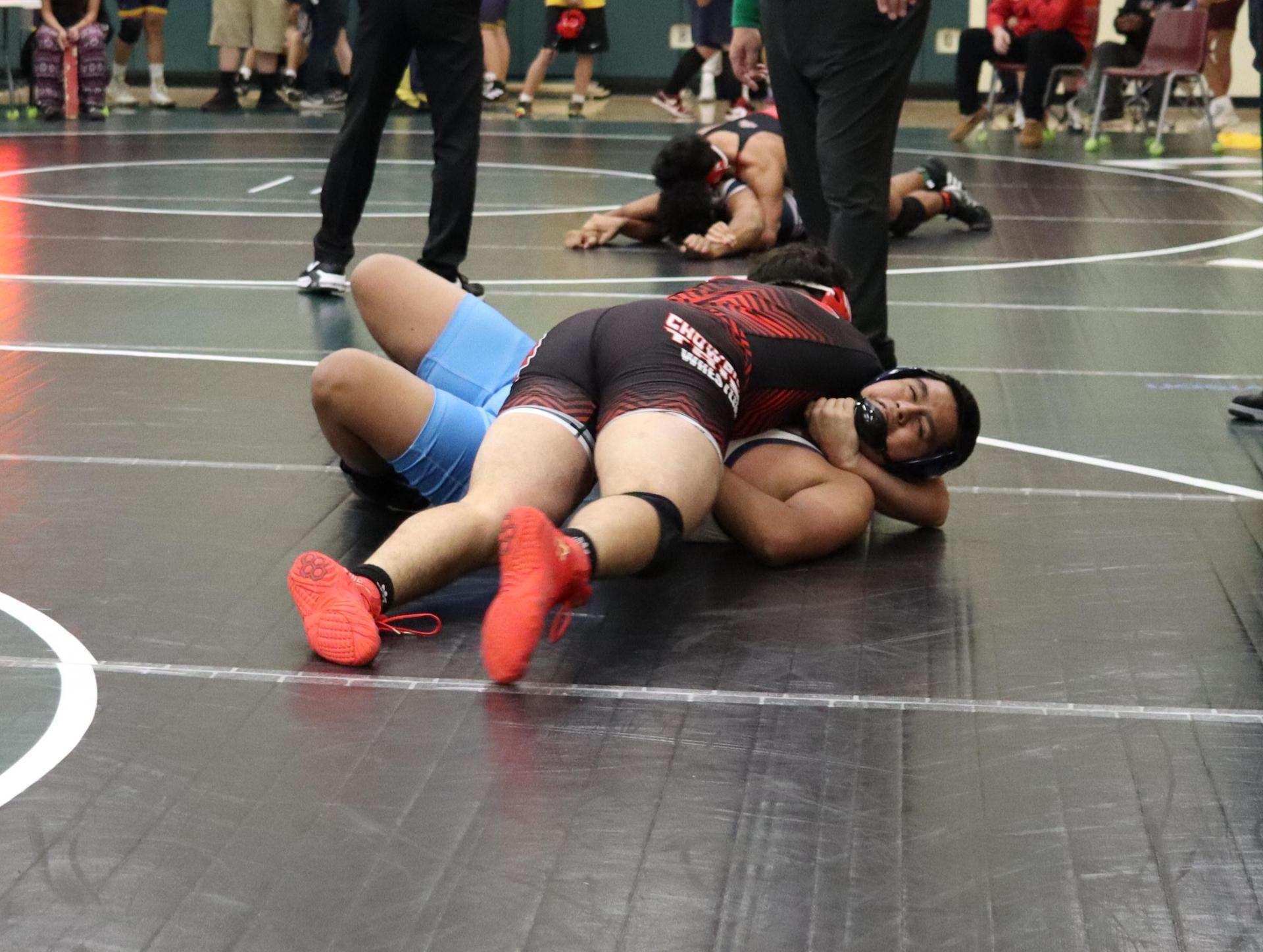 wrestlers in action at the Hawks invitational