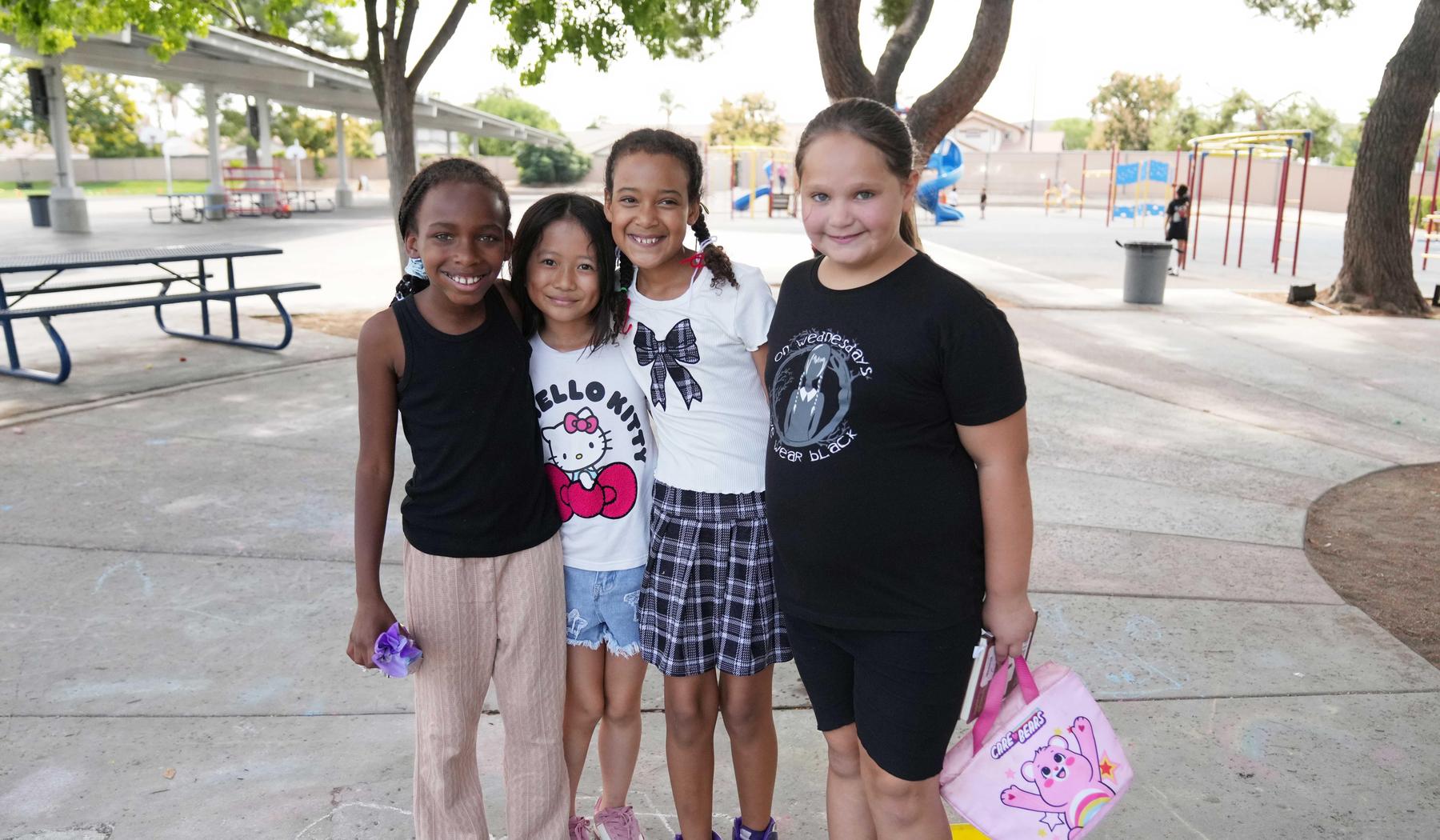 four smiling girls