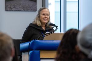 Martha Rial speaks with students