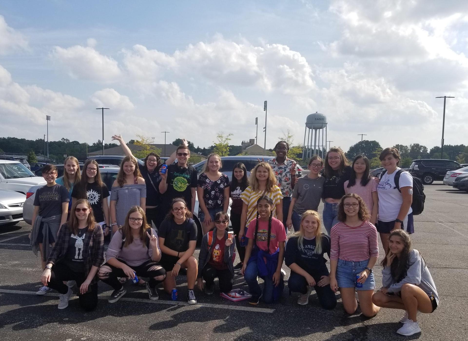 Book Club members outside in the school parking lot