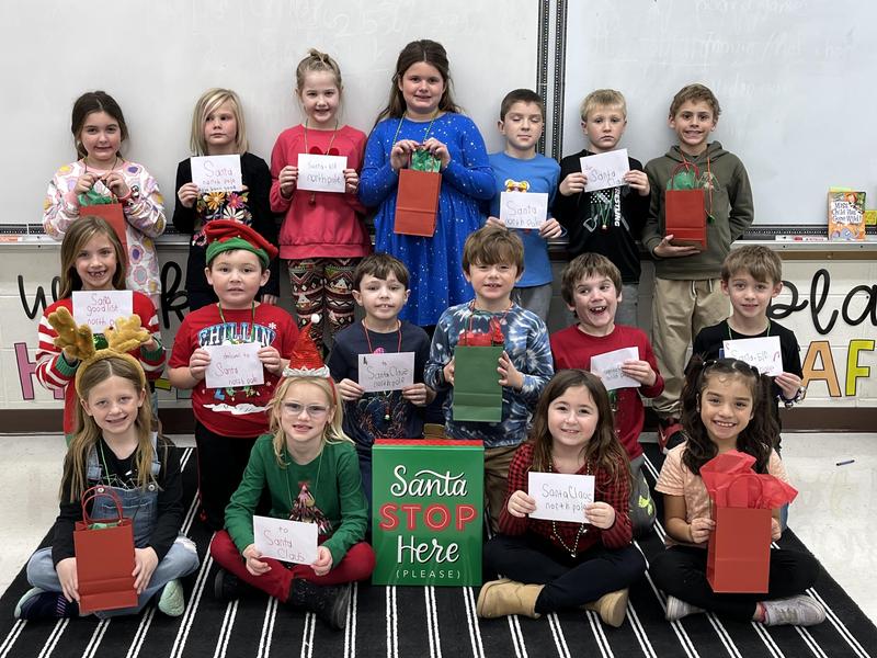 Second grade students in Mrs. Vironda and Mrs Egan’s  class at Coal City Elementary School await the arrival of Santa Claus. The children wrote letters  that included their holiday wishes—Iphones, televisions, mini-fridges, baby dolls, hover boards and more. The students share their letters with readers and wish all a Happy Holiday season.