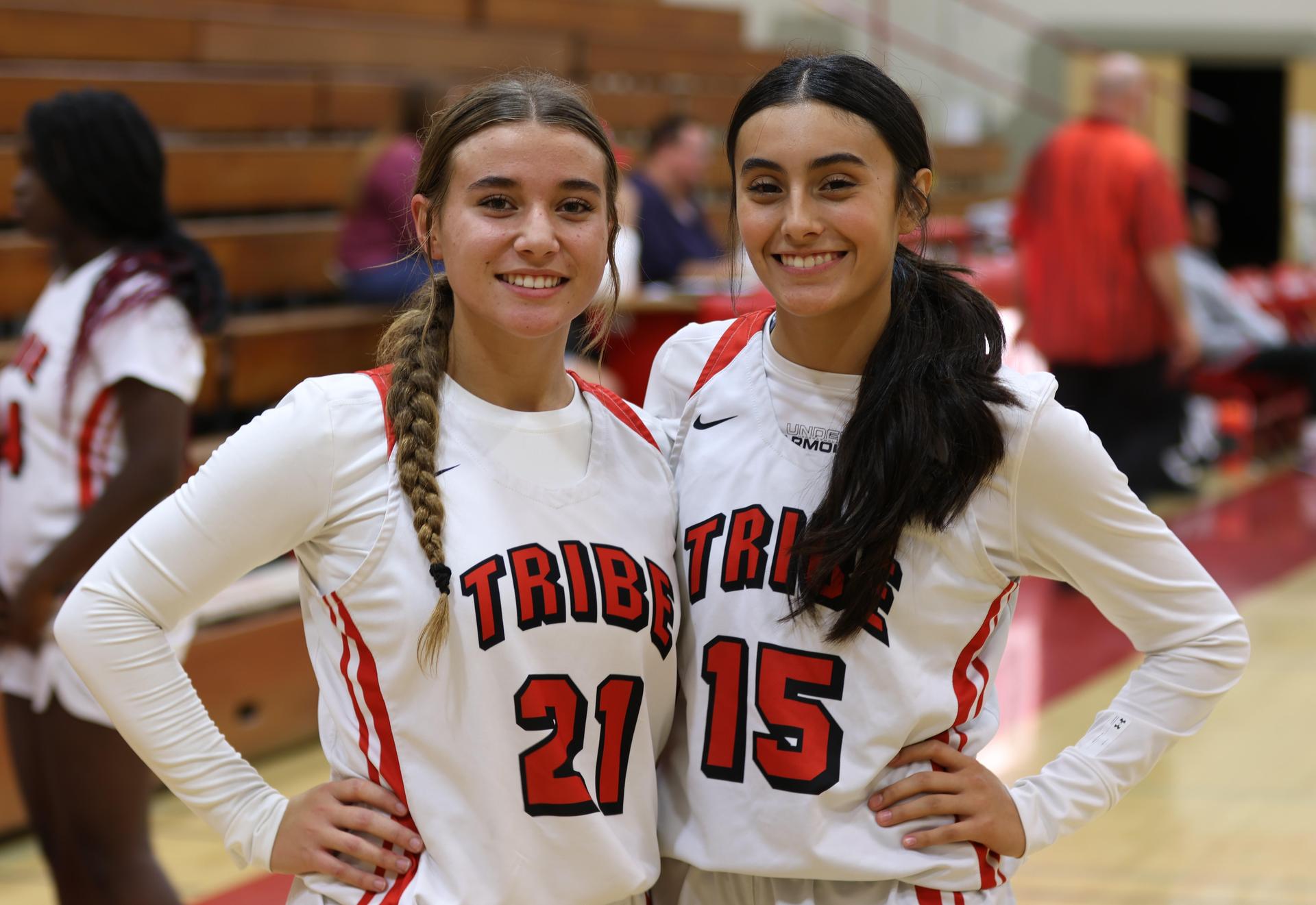 varsity girls playing basketball against mclane