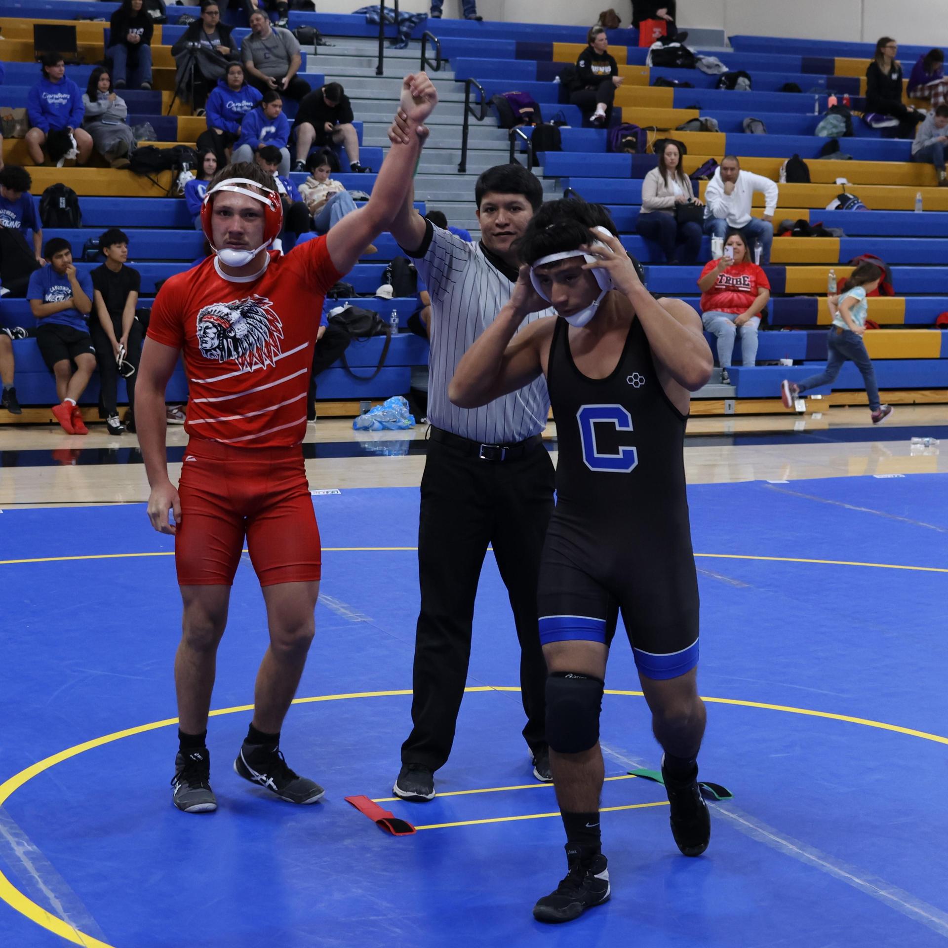wrestlers in action at parlier