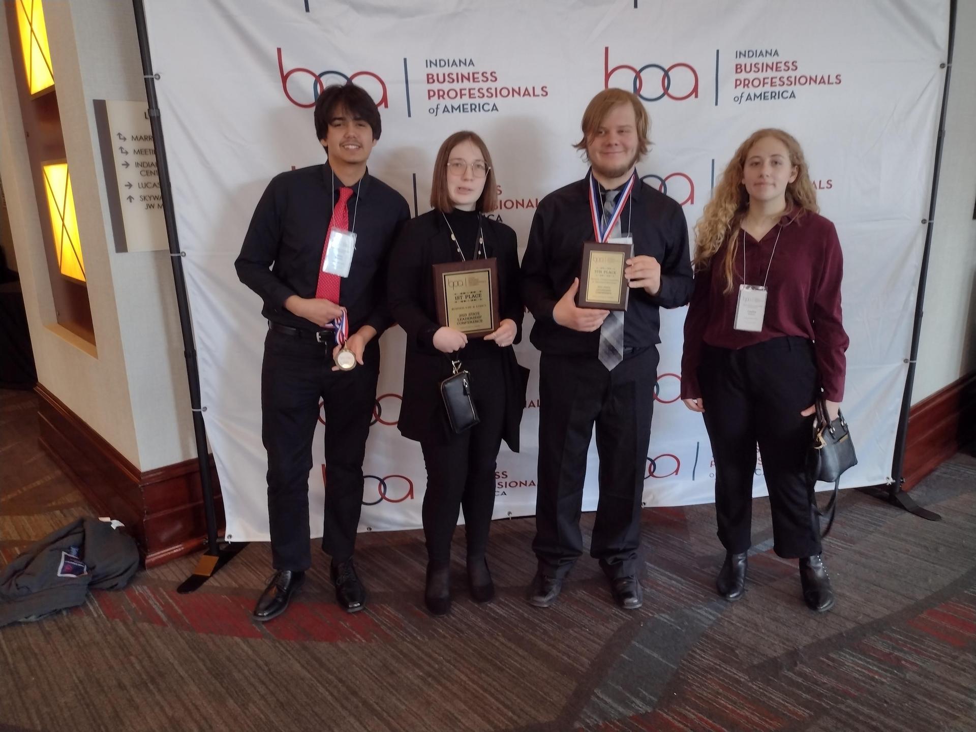 group of students with awards
