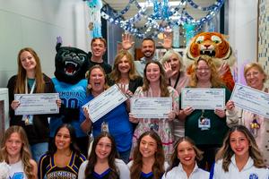 Staff and Students celebrate during Prize Patrol