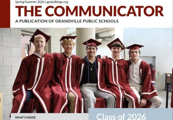 cover of the newsletter with 5 grads sitting and smiling