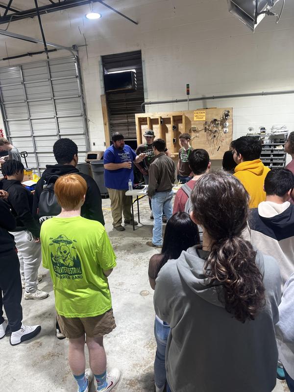 Students learn about electrical wiring.