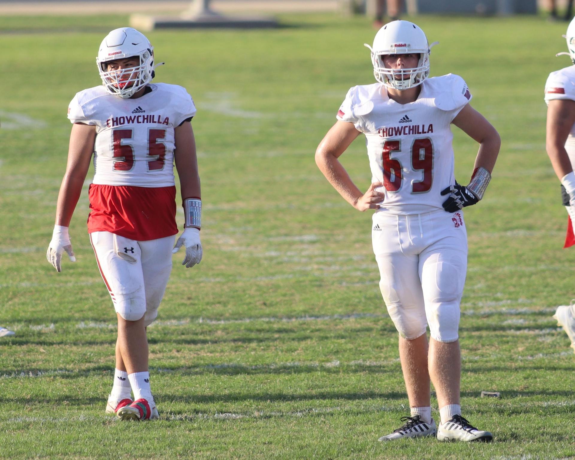 Junior Varsity football players in action against Caruthers