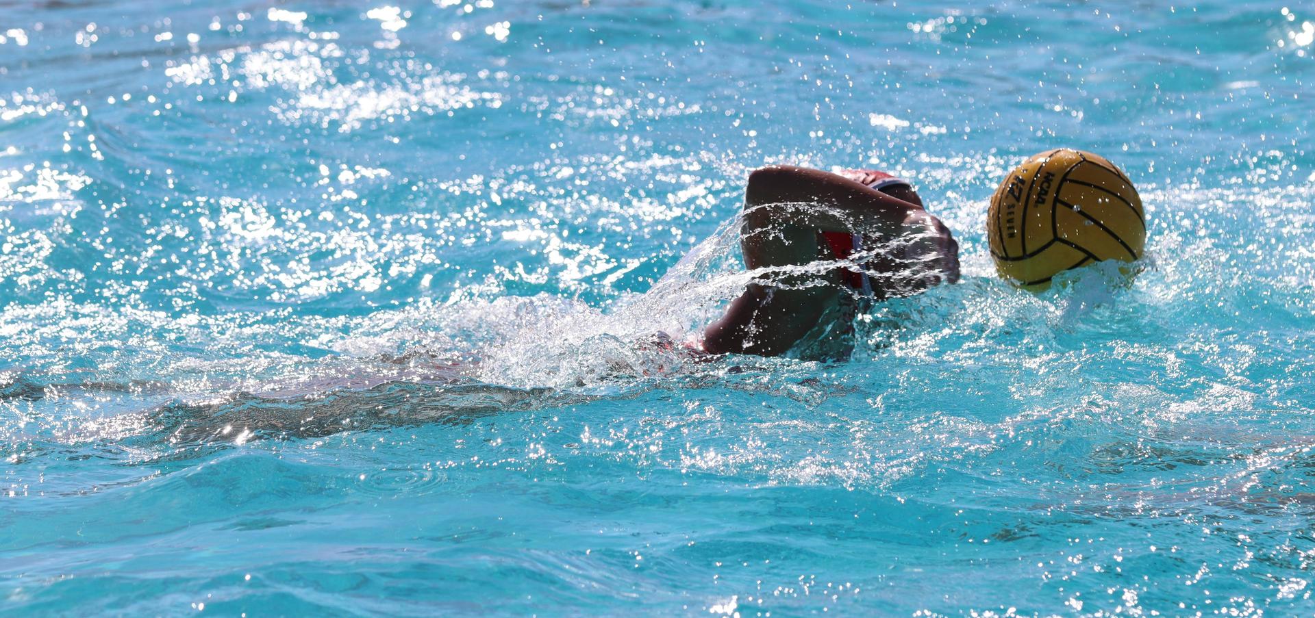 girls playing water polo against Hoover
