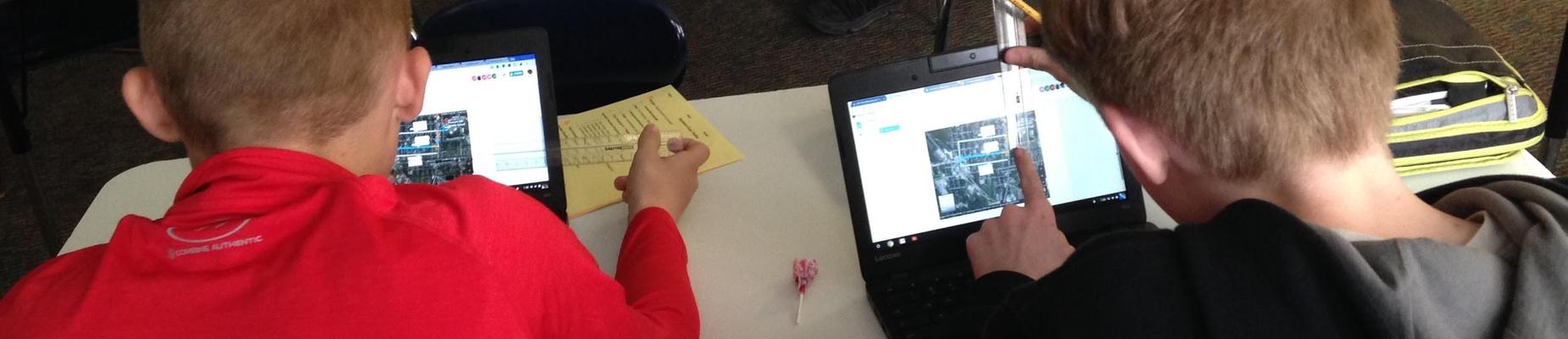 Students using Chromebooks to determine distance