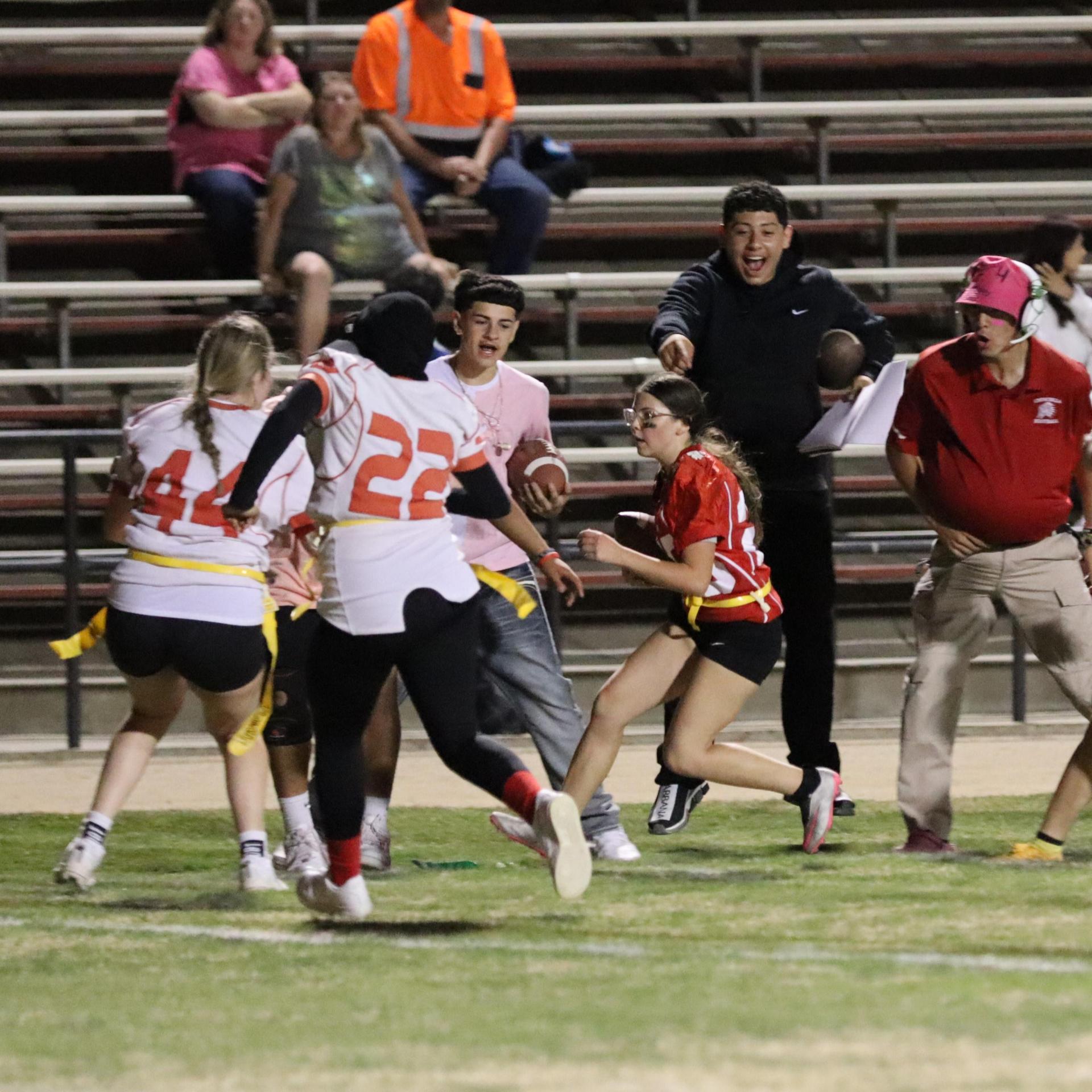 girls playing flag football