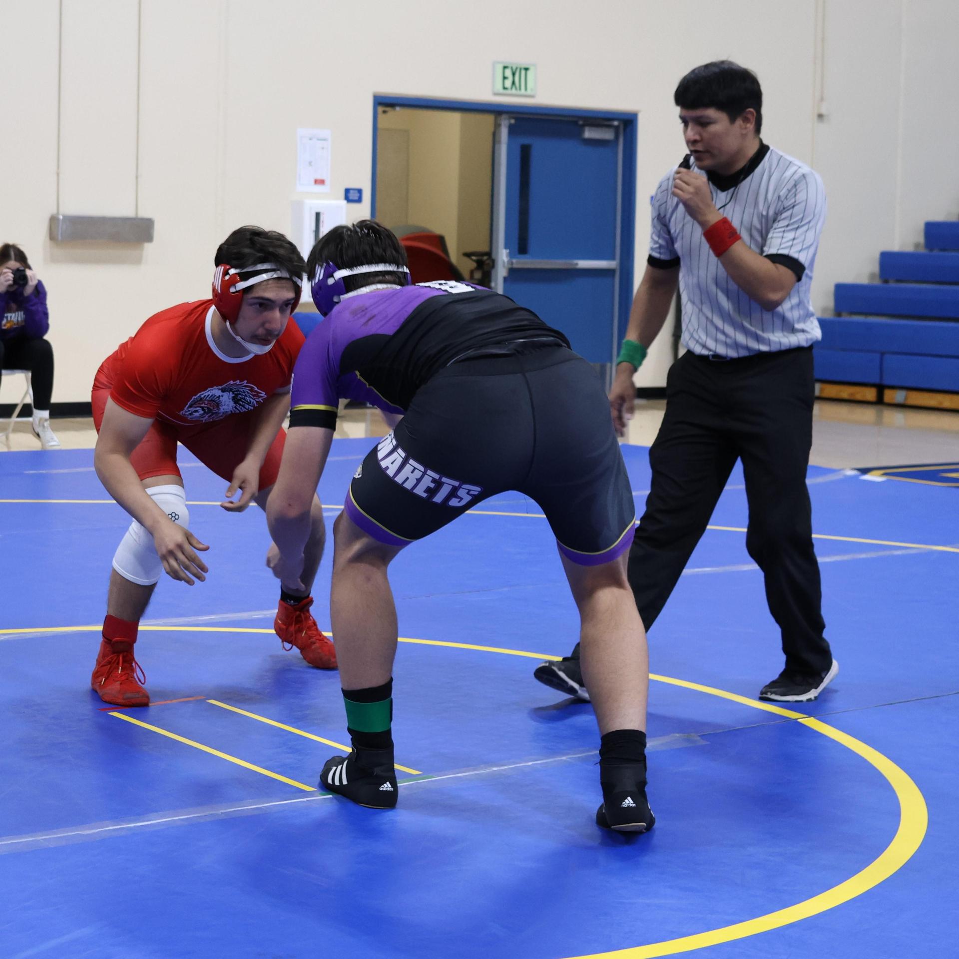 wrestlers in action at parlier