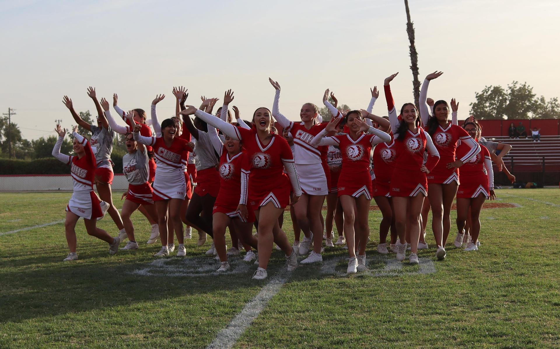 Cheerleaders performing at the football game