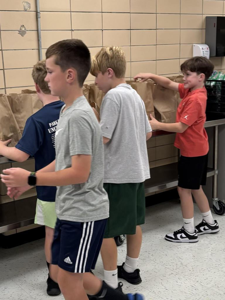 JV football team making Uncle Pete's lunches