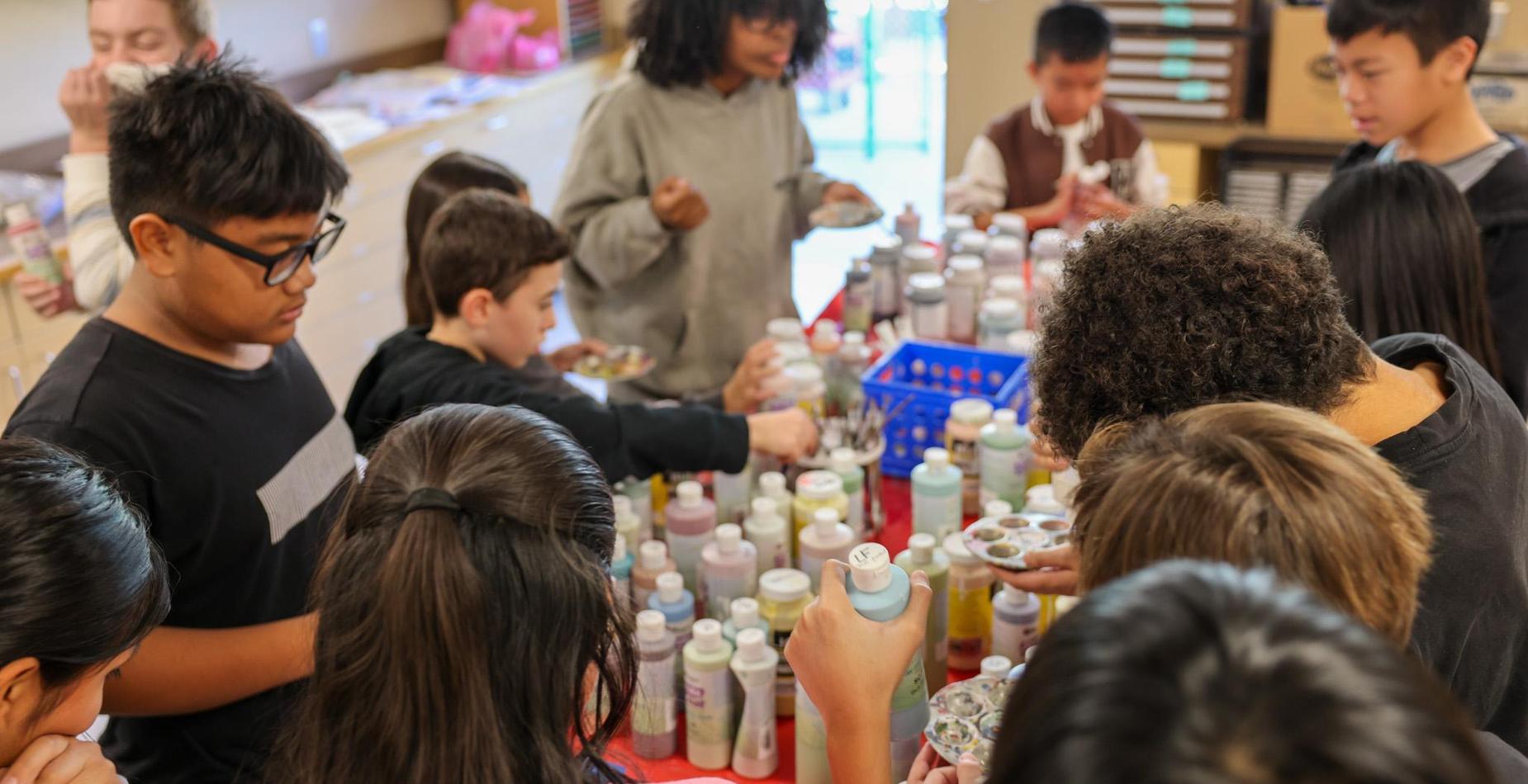 Students Choosing Paint in Art