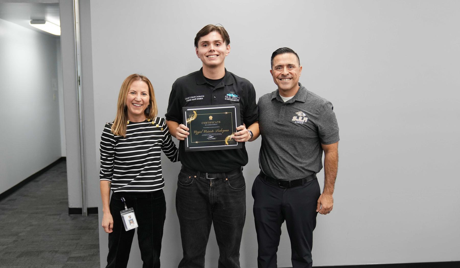 School Counselor, QuestBridge Scholarship winner and school principle during December Board meeting