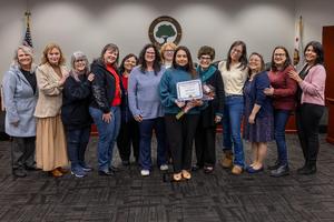 February 2026 Volunteer of the Month, Gisela Castro, from Walt Disney Elementary during recognition