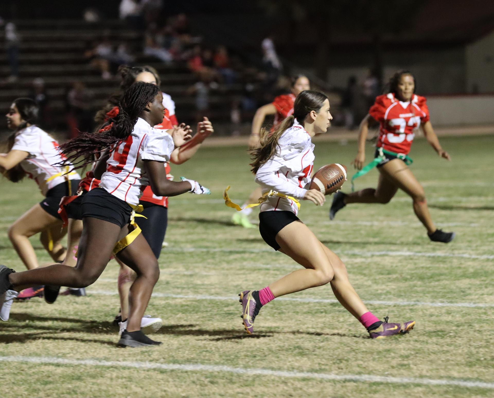 girls playing flag football