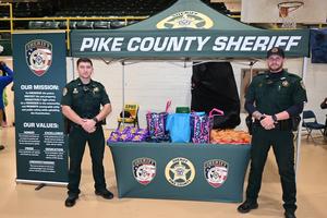 Pike County Sheriff’s Office Deputies Greet Superintendent Dr. Geneva Holmes at Eagles Carnival 2025