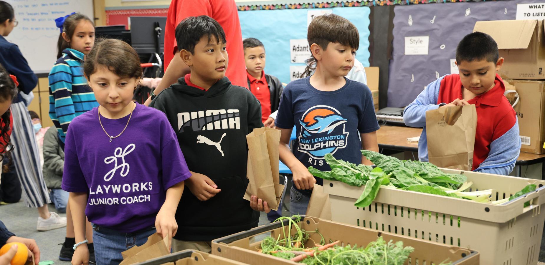Students participating in their school Farmer's Market.