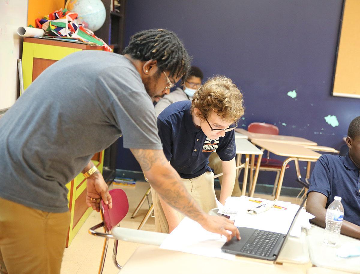 Collage showing students participating in extracurricular activities: aiming in archery, building a robot, and playing the violin in an orchestra