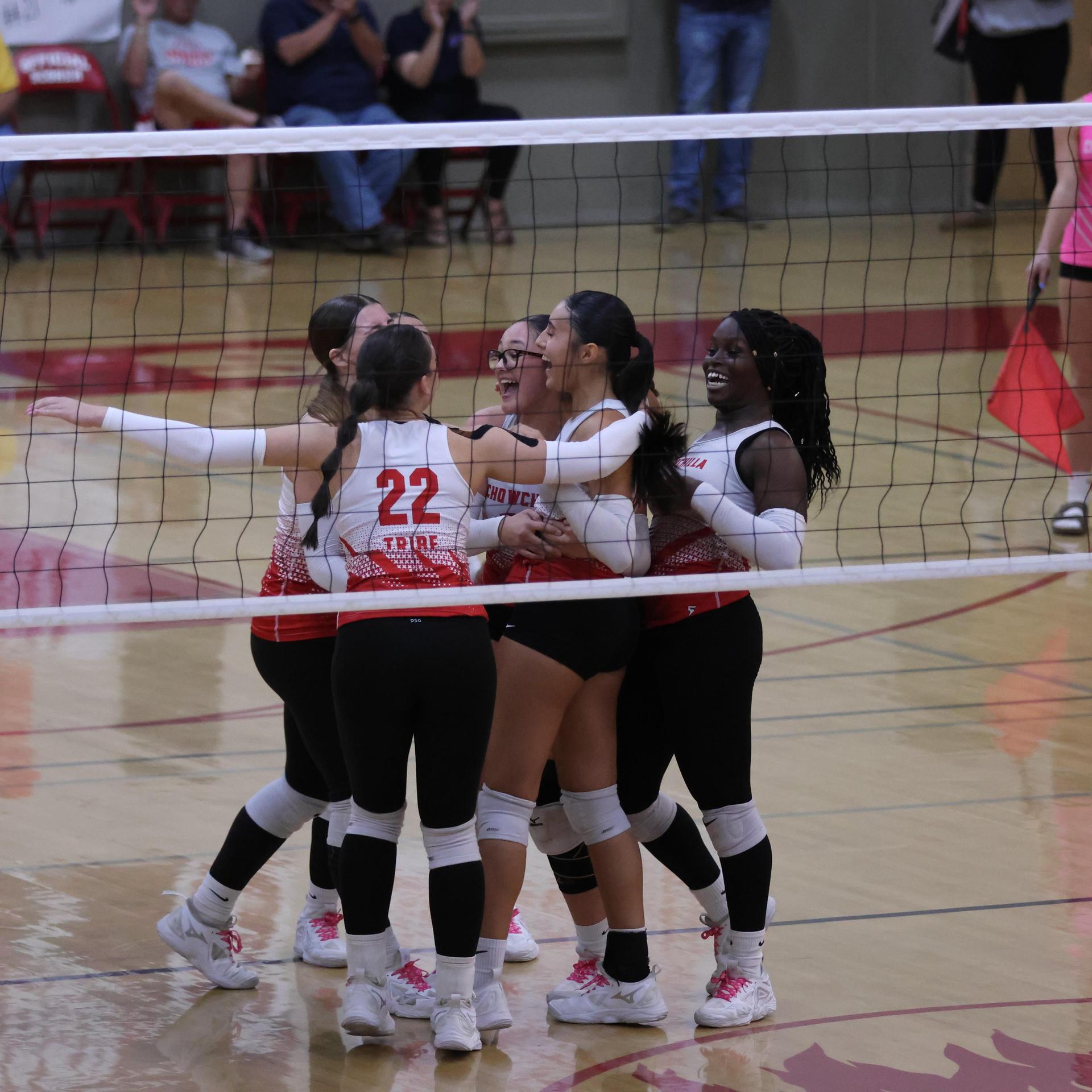 Varsity Volleyball playing vs. Fresno Christian 69