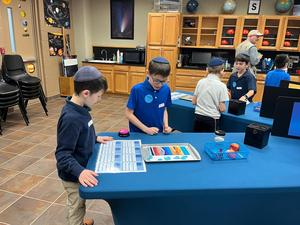 Boys perform experiments at the Tellus museum