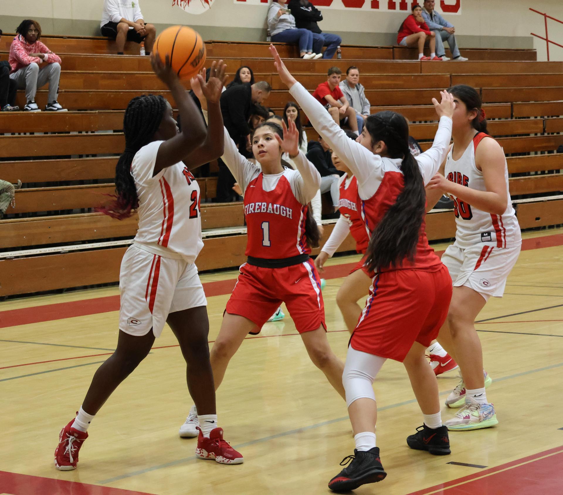 Varsity Girls Basketball playing against Firebaugh