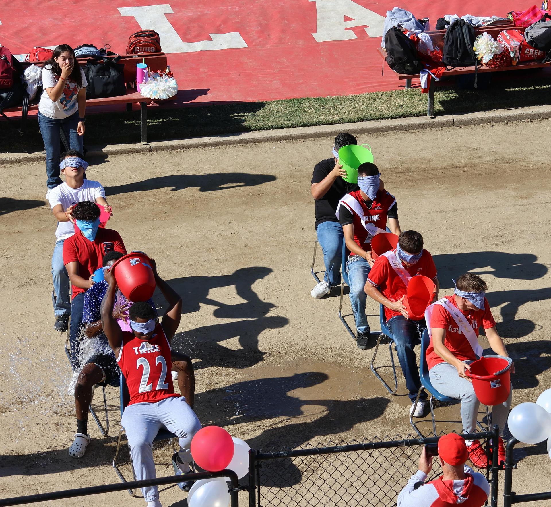 students and staff at the homecoming rally