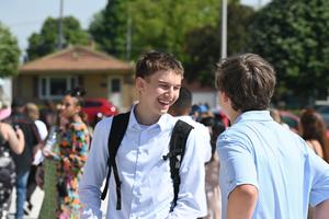 student wearing backpack outside