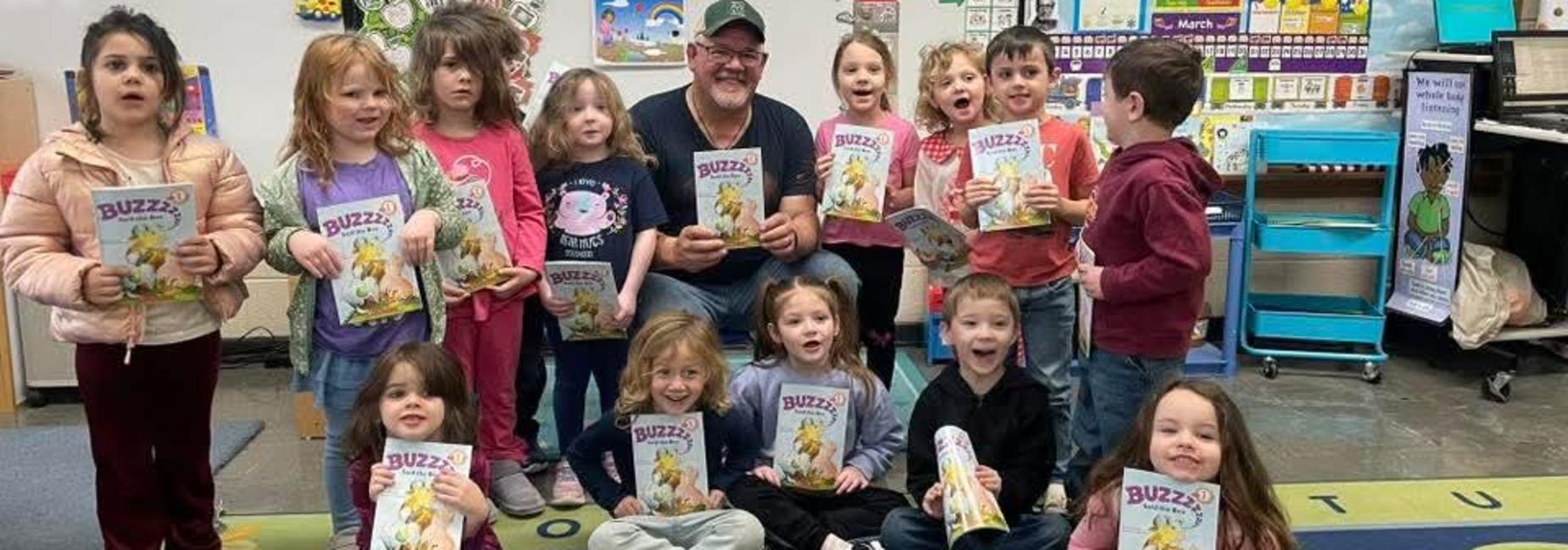 Mr. Larry read to PreK students