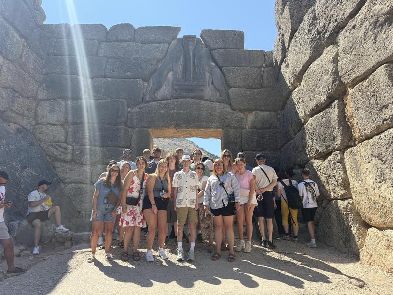 MCS stand in front of an ancient Greek site