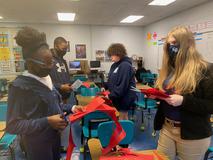 Students working on Christmas door decorations