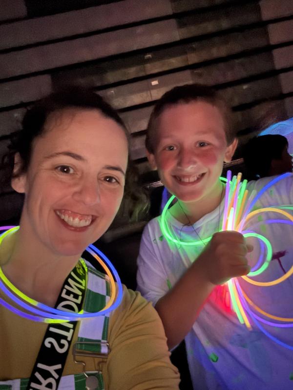 Students and staff at a glow in the dark fun run.