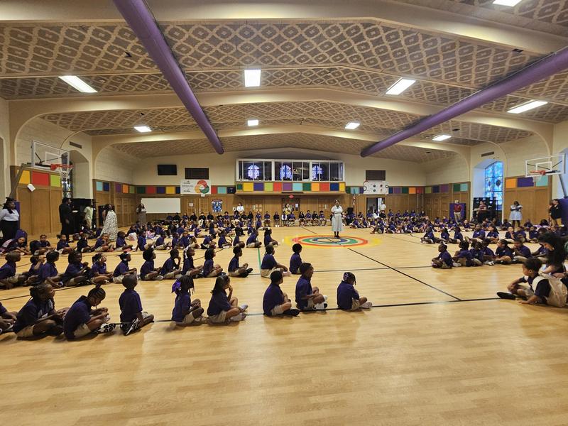 Scholars at assembly