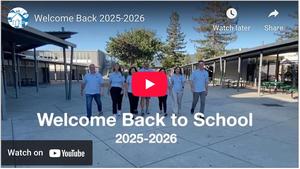 Welcome Back to School 2025-2026 (principals in light blue polo shirts walking toward the viewer)