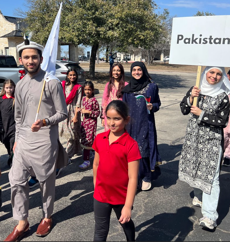 Students walk with Pakistan in World Parade