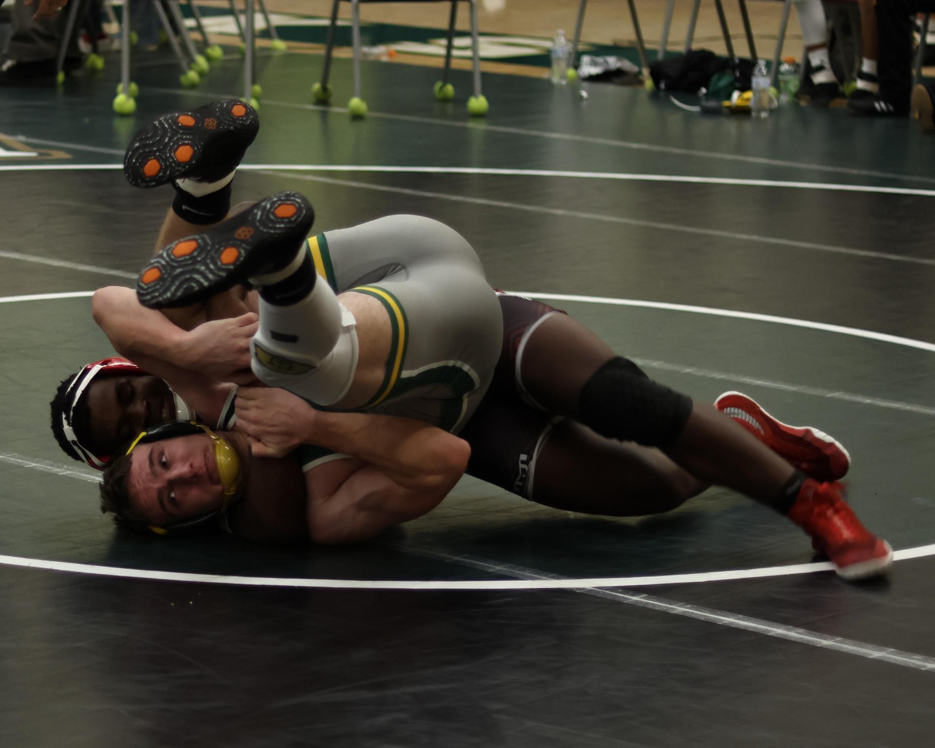 boys wrestling at liberty duals