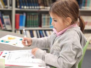 A student completes a word search