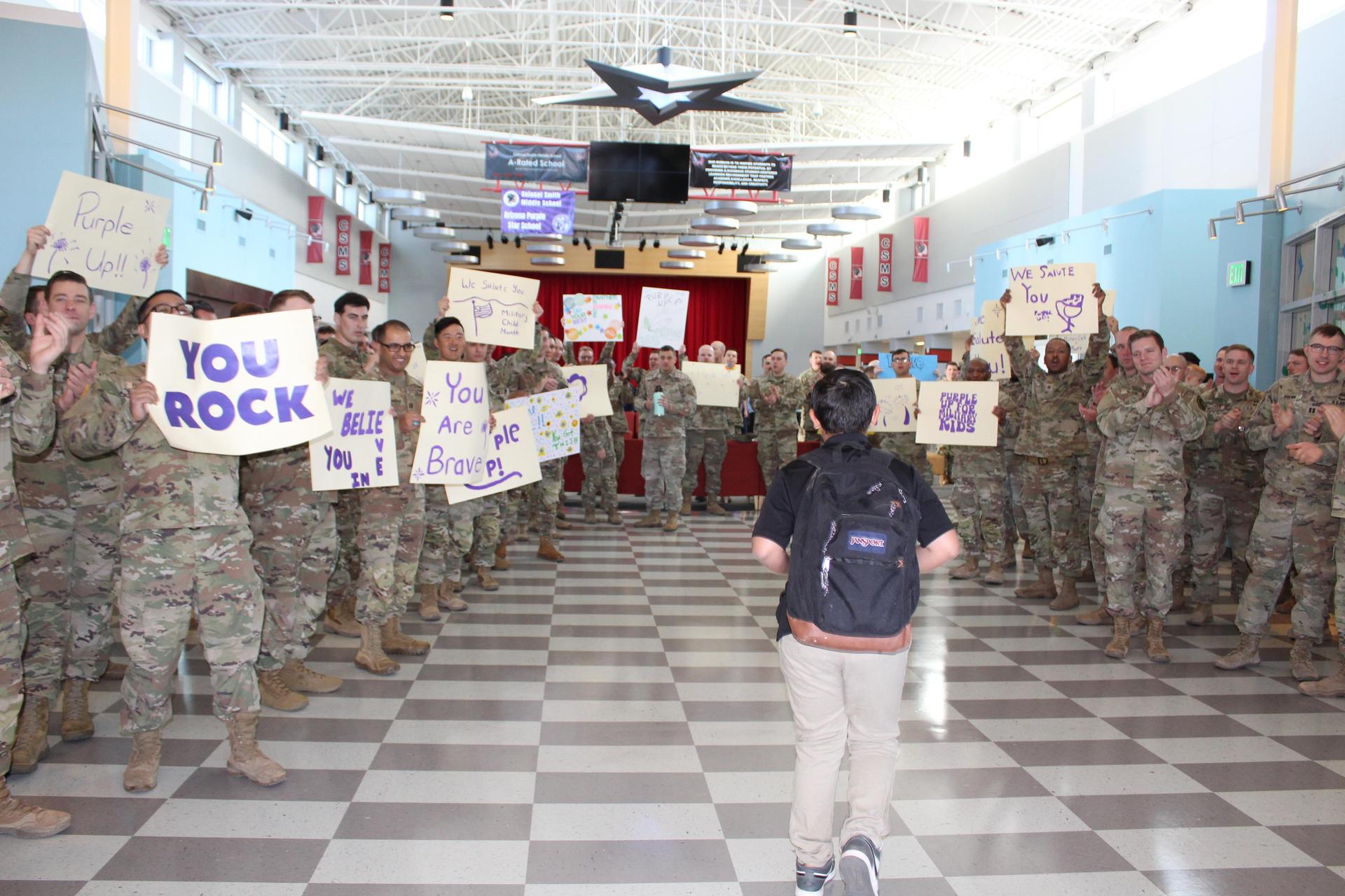 Soldiers showing appreciation to military children