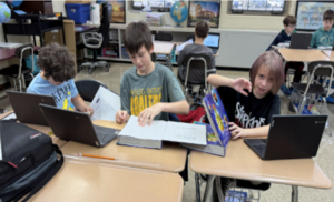 Students work on a rap/song or poem as part of their Ancient China and Ancient India unit.