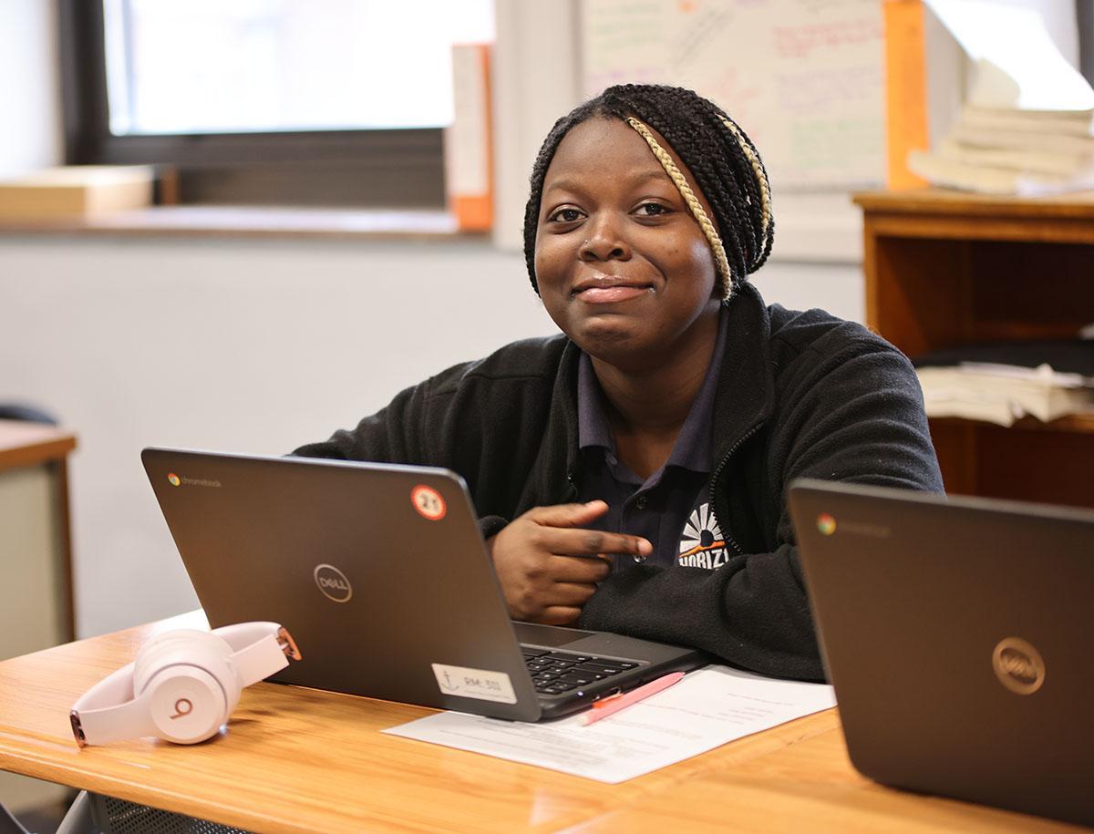 HSA Belmont student working on a science experiment in a lab